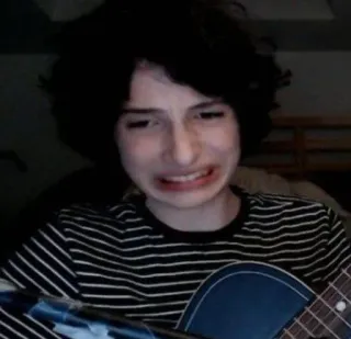 😵‍💫 03b1ded1 Finn Wolfhard celebrity, actor, guitar, crying telegram sticker