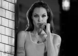 ➰ c89b2fc5 Angelina Jolie @Torridawm attrice, celebrità, bianco e nero, ritratto, donna, tatuaggio telegram sticker
