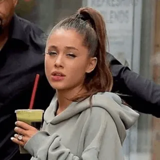 🍸 9ba8fe2b Ariana Grande celebrity, singer, pop star, woman, hoodie, ponytail telegram sticker