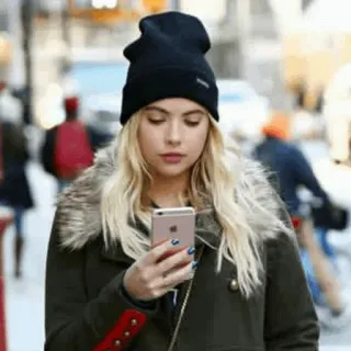 🍓 43d2212e woman, phone, winter, city, street, beanie telegram sticker