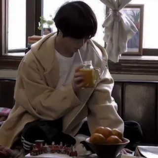 📦 1a7c6cdd person, drink, indoor, sitting, coat, clothing whatsapp sticker