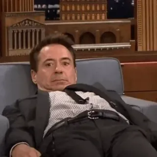 ⭐️ 7c141cbc Robert Downey Jr. ator, celebridade, homem, sentado, terno telegram sticker