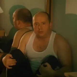 😔 b5347f2c pria, kaus tanpa lengan, potret, duduk, dalam ruangan telegram sticker