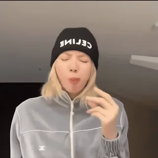 🍪 8de2475f woman, eating, beanie, gray, casual, indoors whatsapp sticker