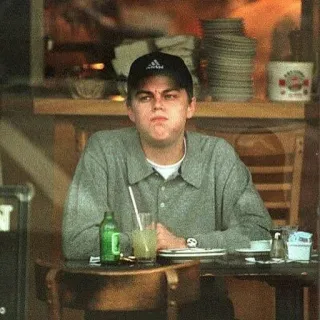 😑 c7ede413 Leonardo DiCaprio homem, sentado, bebendo, ator, celebridade telegram sticker
