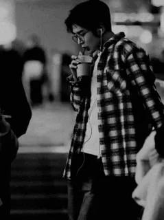 💸 d9838c91 man, plaid shirt, glasses, street, city, drink, headphones telegram sticker