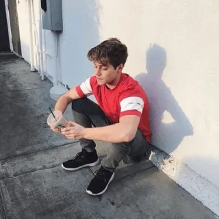 🛋 8c01bcc0 man, sitting, casual, drink, pose, red shirt telegram sticker