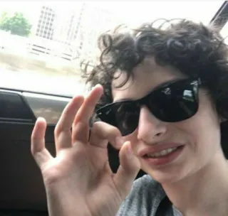 π 02921bf8 Finn Wolfhard actor, singer, glasses, curly hair, teenager telegram sticker