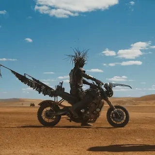 🏍 76c16bcb Mad Max motocicletta, terra desolata, post-apocalittico, deserto, veicolo, pilota, Mad Max telegram sticker