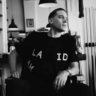 💰 e26715d8 LAID man, black and white, portrait, LAID, casual, sitting telegram sticker