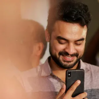 🤗 25c3d1af man, smiling, smartphone, portrait, person, happy telegram sticker