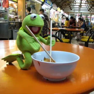😄 56b68e38 Kermit Kermit the Frog, food, chopsticks, bowl, table, puppet, eating telegram sticker