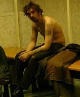 🧟 7bb1ab7f man, shirtless, sitting, indoors, tattoos, casual whatsapp sticker