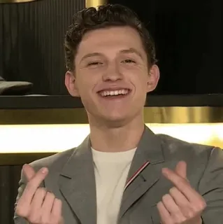 🌪 7d887265 Tom Holland ator, celebridade, sorriso, mãos, coração telegram sticker