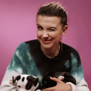 😉 5221e68e Millie Bobby Brown attrice, celebrità, cane, cucciolo, animali, occhiolino, Millie Bobby Brown telegram sticker