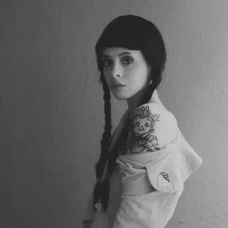 ▪️ bedf6b3c woman, portrait, pigtails, tattoo, black and white, vintage, person telegram sticker