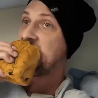 🍞 e561a65a man, eating, sandwich, food, portrait, beanie, person telegram sticker