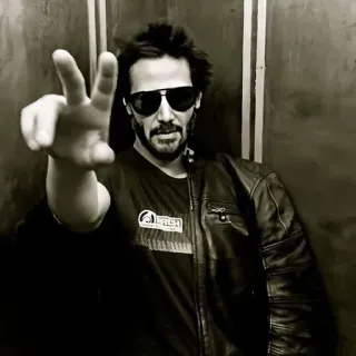 ✌ b525d47b Keanu Reeves Keanu Reeves, acteur, vredesteken, beroemdheid, zonnebril telegram sticker