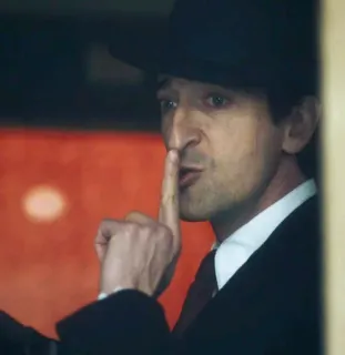 🤫 15c44d5d man, silence, portrait, finger, hat, suit whatsapp sticker