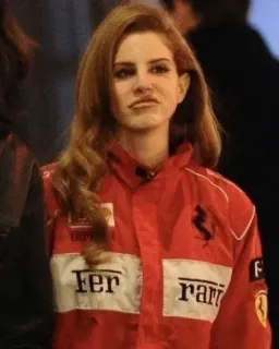 🫤 a012ae64 Lana Del Rey Lana Del Rey, Ferrari, pembalap mobil, setelan balap merah, selebriti telegram sticker