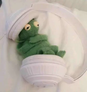 🎶 e11f01c1 เคอร์มิท, กบ, หูฟัง, เพลง, ของเล่น, หุ่นกระบอก, น่ารัก, สีเขียว telegram sticker