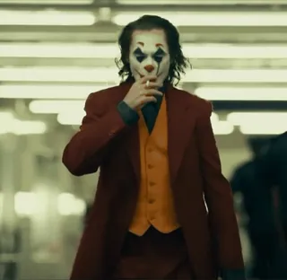 ♦️ b2a9e0e6 Joker villano, cigarrillo, fumar, payaso, película, DC Comics telegram sticker