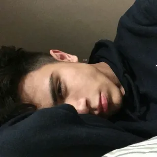 😒 387e1550 person, male, young man, portrait, lying down, indoors telegram sticker