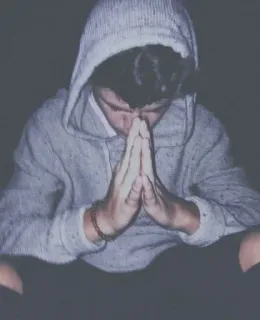 🙏 f5005a58 hoodie, portrait, person, indoors, seated, hands, praying telegram sticker