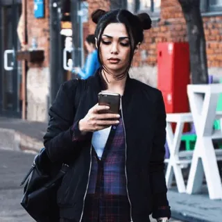 🃏 65624c40 woman, mobile phone, urban, street, casual, city telegram sticker