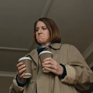 🔪 ba13cd97 женщина, кофе, две чашки, тренч, выражение, недовольна, в помещении telegram sticker